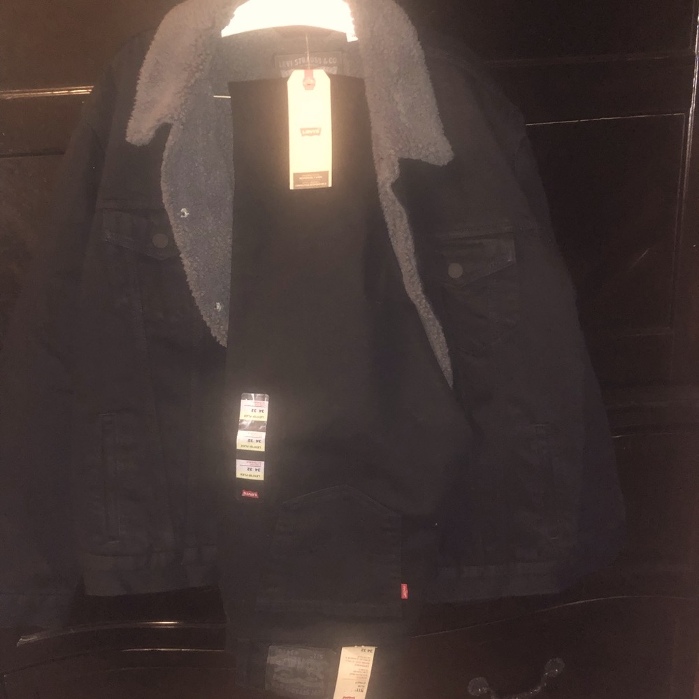 Mens black Levi’s trucker jacket with 511 slim fit Levi’s jeans